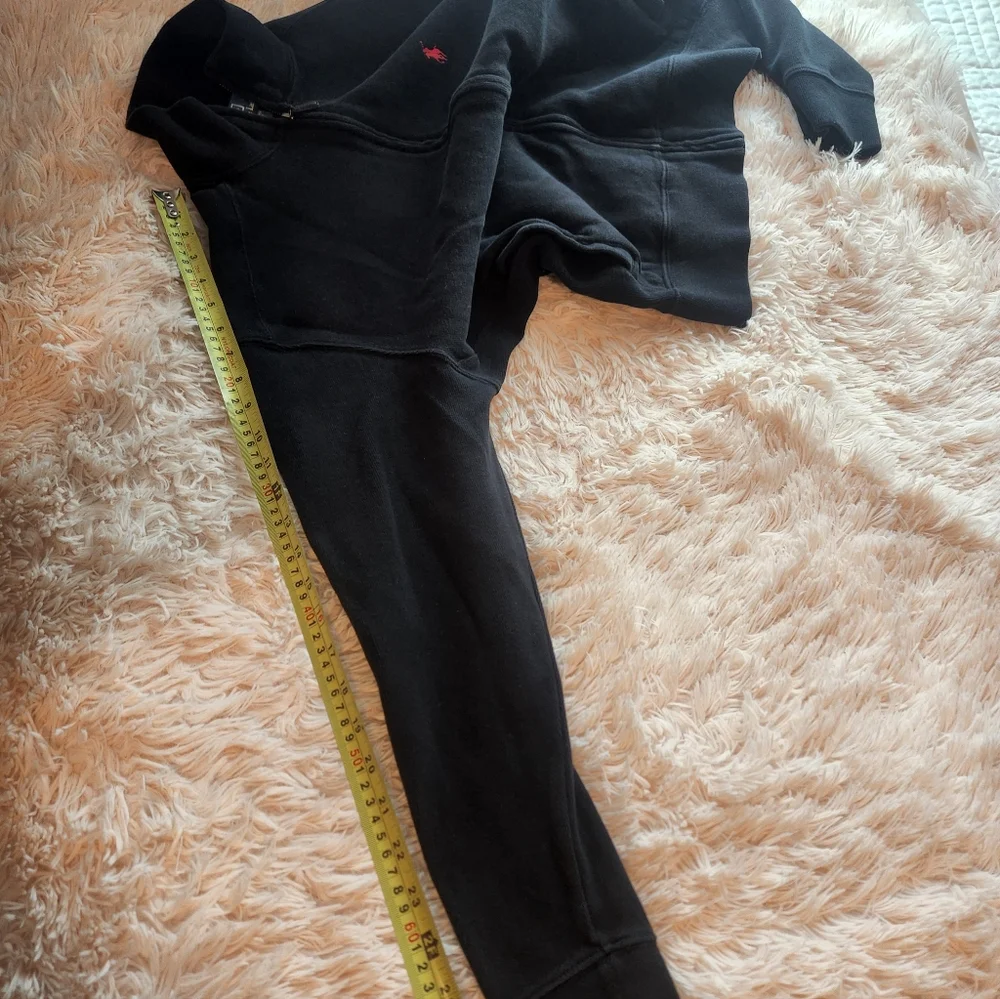 Black Zip-Up Jacket with Red Logo